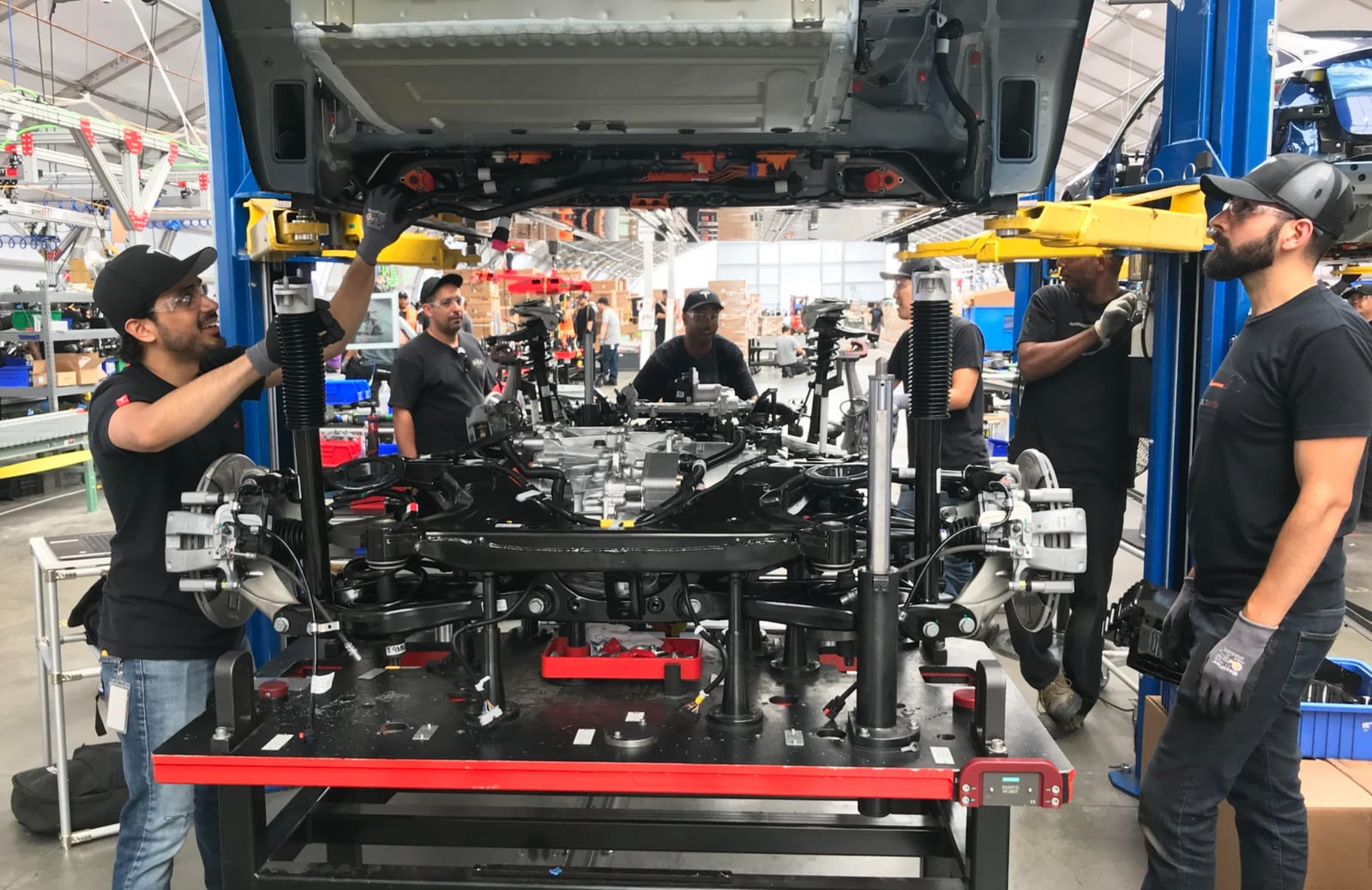 Building the first Model 3s in the GA4 tent at Fremont Factory to support the initial production ramp.